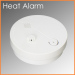 Battery operated photoelectric heat alarm