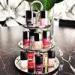 Three Layers Metal Display Shelf Floor Cosmetic Counter Displays Tower
