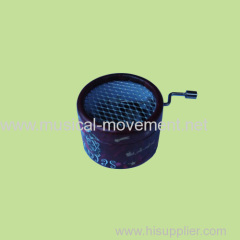 Customized Crank Operated Mesh Cover Round Paper Music Box