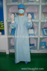 Surgical gown with knitted cuff