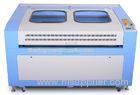 LCD Control Water Cooling CO2 Laser Cutting Machine With Rotary System