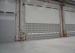 Water proof single sheet overhead section door for industrial warehouse and logistic use