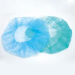 Disposable nonwoven surgical hats
