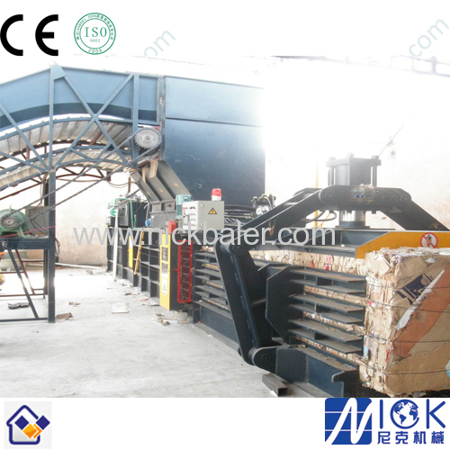 Cardboard hydraulic packing machine