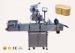 Electric automatic flat surface label applicator with collection worktable