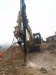 Excavator mounted hydraulic drilling machine