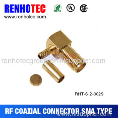 Right angle rear mount bulkhead crimp RF SMA male connector