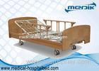 Two Manual Crank Nursing Home Beds Solid Wood Structure Aluminum Alloy Side Rail