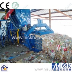 Newspaper recycling strapping machine