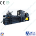 with conveyor feeding waste paper recycling baler