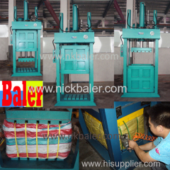 Used clothes press baler with lifting chamber