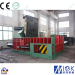 Hydraulic balerwith metal block into cube machine