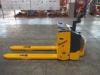 CE Manual Warehouse Equipment Stand On Pallet Truck With Vertical Driving System