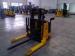 1 Ton Electric Straddle Stacker with Wide Leg Width and Rod