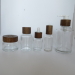 wood cap pump and glass bottle jar