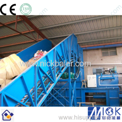 Baling machine with automatic strapping machine