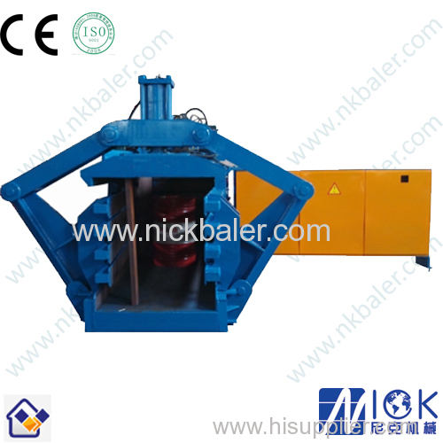 Cardboard twin chamber baler with automatic tie baler