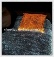 Photoluminscent fabric material in various colors