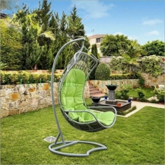 Outdoor patio rattan wicker material hammock with colorful cushions