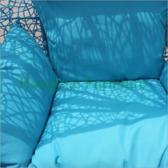 Patio blue rattan wicker hammock with blue cushions supplier