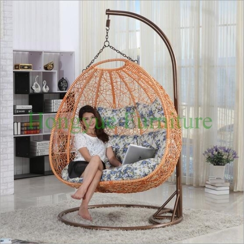 Indoor rattan lovers hammock with colorful cushions designs