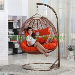 Indoor rattan lovers hammock with colorful cushions designs