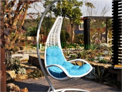 White rattan hammock with blue cushions supplier from china