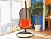 Brown rattan hammock with orange color cushions supplier