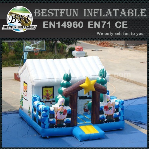 Snowman inflatable bounce house for christmas with tree