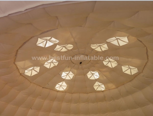 White inflatable dome tent with removable door