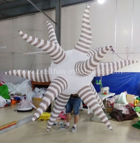 Color changing inflatable star light for event decorations