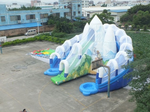 Giant double water slide with mountain climbing