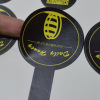 Paper sticker with coated paper and lamination material