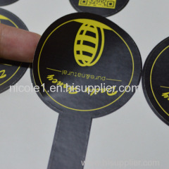 Paper sticker with coated paper and lamination material