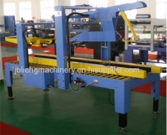 Carton sealing machine for cans