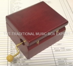 WINE COLOUR WOOD HAND CRANK VINTAGE MUSIC BOXES