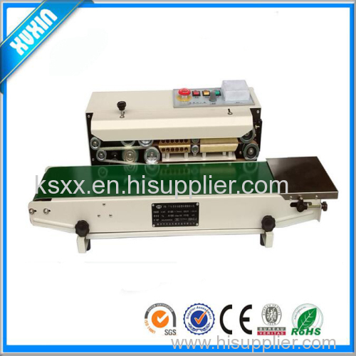 Plastic bags sealing machine