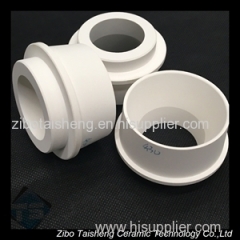 Aluminum titanate sprue bushing for aluminum alloy low pressure die casting