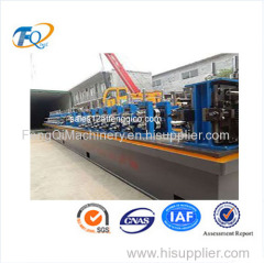 Welded steel tube reducing sizing mill