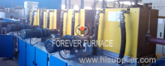 Round bar induction heat treatment system