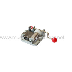 MINIATURE HAND CRANK CLEAR ACRYLIC MUSIC BOX