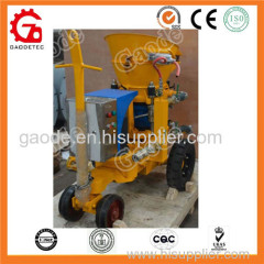 Dry mix concrete spraying machine