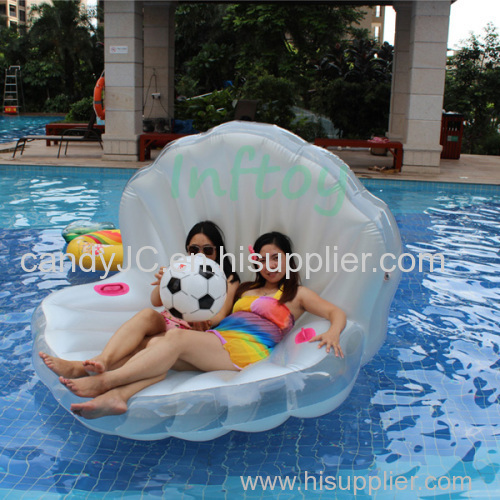 Inflatable white shell with pearl ball