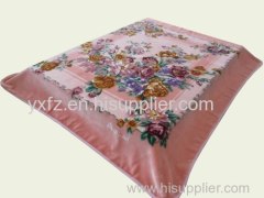 purple color raschel blankets used in bed