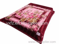 purple color raschel blankets used in bed