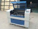 Small mini laser cutting machine for wood fabric with CO2 glass sealed laser tube