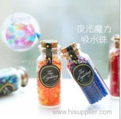 beautiful and cute small bottle with water absorbent crystal soi for grow flowers and home decoration