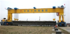 Straddle carrier for railway bridge construction