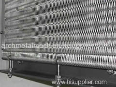 Conveyor belt mesh maintains privacy and adequate ventilation for buildings