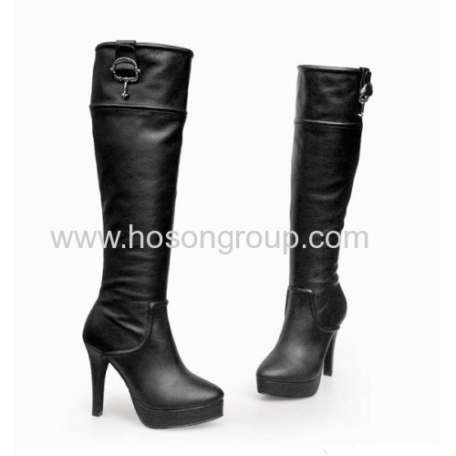 Black buckle decorated high heel boots